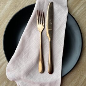 Blush linen napkin, black matte crockery and rose gold cutlery
